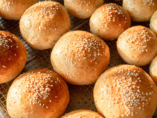 Fresh homemade burger buns with sesame seed.