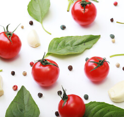 Tomato, basil, spices, pepper, garlic. Vegan diet food, creative cherry tomato composition