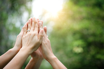 Please dispose of plastic bottle into the tank. A man throw rubbish in the trash can by separate...
