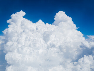 Obraz na płótnie Canvas View of blue sky background with white cloud on high level