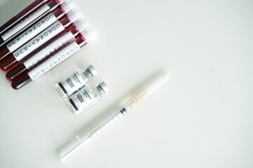 coronavirus covid 19 check, corona virus vaccine and blood tube, researchers are finding ways to...