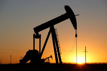 Pumpjacks, the sunset of New Mexico oil field, shot near Carlsbad.