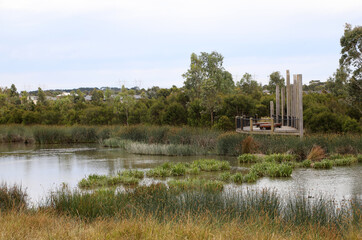 Wetlands in South East suburbs of Melbourne, Victoria, Australia showing trees, gardens, lake