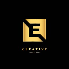 E logo. Initial letter E with gold color. Luxury slice logo design concept, fit for company and business.