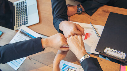 Group of diversity people fist bump holding hands together power of tag team. Teamwork Multiethnic...