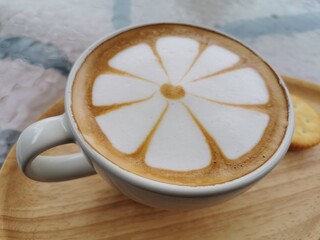 Top view of coffee in a ceramic mug.