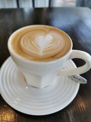 Top view of coffee in a ceramic mug.