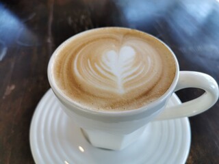 Top view of coffee in a ceramic mug.