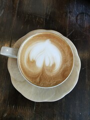 Top view of coffee in a ceramic mug.