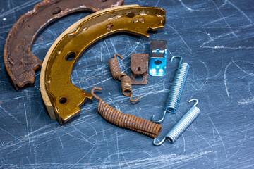 handbrake brake pad replacement concept, old rusty auto parts are new.