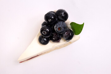 Blueberry cheese cake red berry jam stuffing on white background