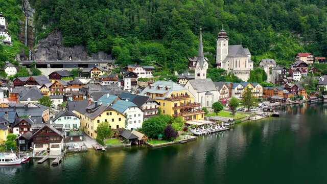 View of famous Hallstatt mountain village in the Austrian Alps at beautiful light in summer, Salzkammergut region, Hallstatt, Austria. Hallstatt village on Hallstatter lake in Austrian Alps.
