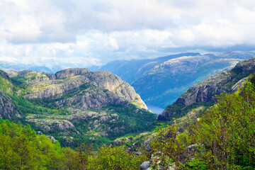 Beautiful mountain landscape. Scenery along the Preikestolen pathway. Preikestolen or Pulpit Rock is a famous tourist attraction in Norway