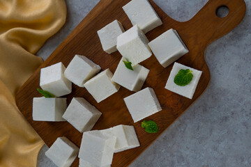 Mint leaf on Diced Paneer or cottage cheese 	