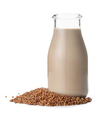 Jug of buckwheat milk isolated on white background