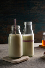 Two bottles of fresh milk	