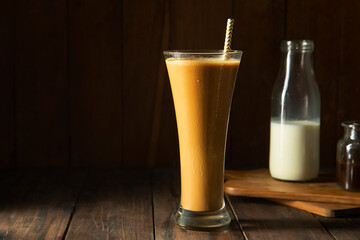 A tall Glass of Cold Coffee a  coffee drink with fresh milk	