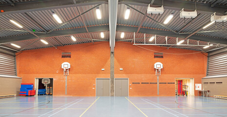 Interior of a large school gym hall © michaklootwijk