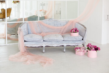 Interior of white room in classic royal luxury style with beautiful sofa