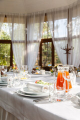 Table setting. Restaurant Served table for party in light neutral colors