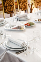 Table setting. Restaurant Served table for party in light neutral colors