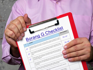 Business concept about Borang G Checklist with phrase on the piece of paper.