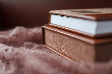 Elegant brown book with beautiful pattern. Wedding photobook. Wedding photo album