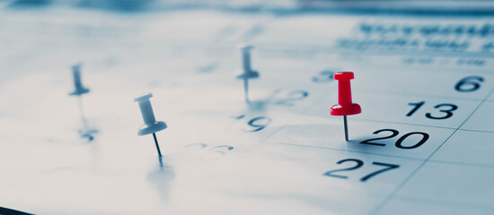 Calendar page pinned in a calender on datebusiness meeting schedule, travel planning or project...