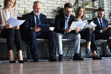 Modern business people waiting for job interview.