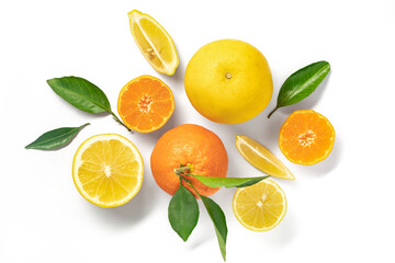 Background summer tropical fruits with leaves, grapefruit, orange, tangerine, lemon on white background. Flat lay, top view