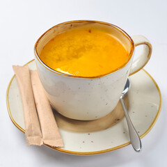 Cup with green tea over white background. Hot tea for cold weather.