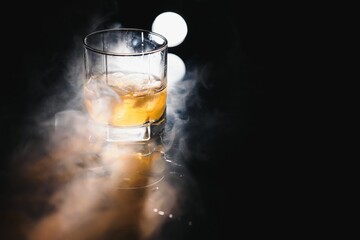 Glass of scotch whiskey and ice