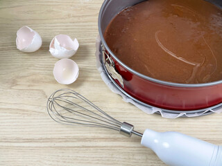 Dough for chocolate cake in the round form