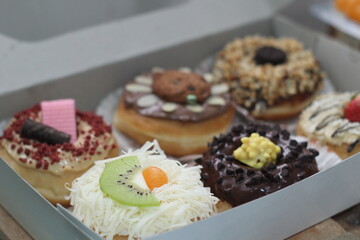 cupcakes and donnut with cream and chocolate