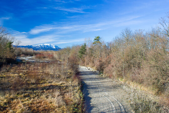 Dry river Schwarza in Bad Erlach and view of Rax Mountain in Lower Austria