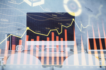 Multi exposure of stock market chart drawing and office interior background. Concept of financial analysis.