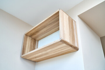 Elegant wall mounted wooden shelf made with bleached solid oak timber, bottom view