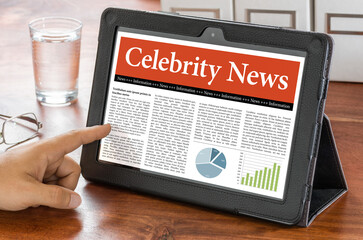 A tablet computer on a desk - Celebrity News