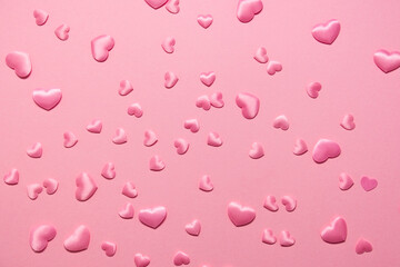 Valentine's day background. pink hearts on a pink background.