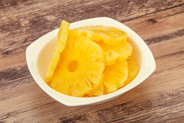 Marinated pineapple rings in the bowl