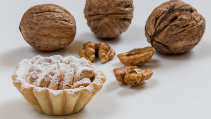 Mini cookies with flavors on white background