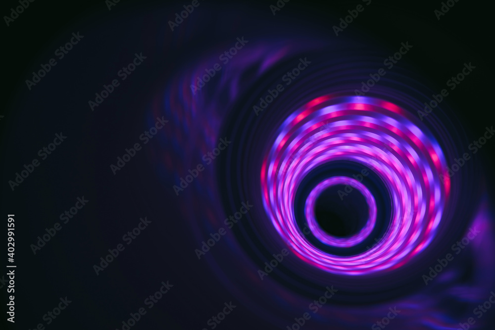 Poster Beautiful Abstract swirl tunnel with violet light on a background pattern textured for design.