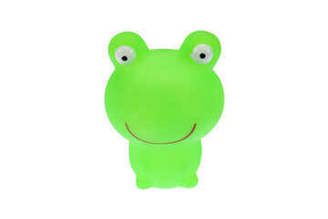 Green toy frog. On a white background, isolated.