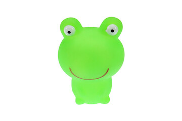 Green toy frog. On a white background, isolated.