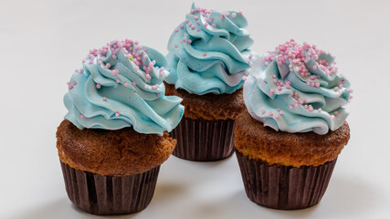 Cupcakes with cream and beautiful decoration