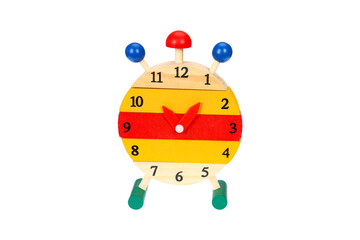 Toy wooden clock alarm clock. On a white background, isolated.
