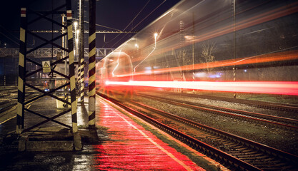 Obraz premium Trian coming to railway station on long exposure - Vajnory/Bratislava