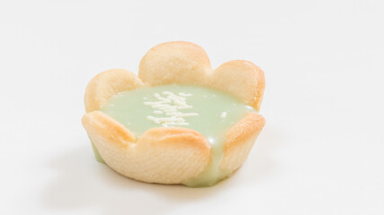 Mini cookies with flavors on white background