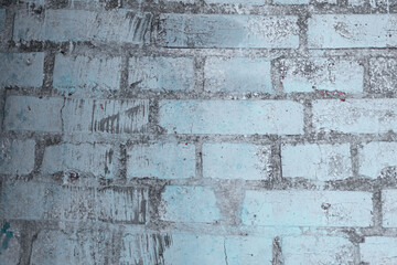 Wall of blue painted brick. Texture for design.