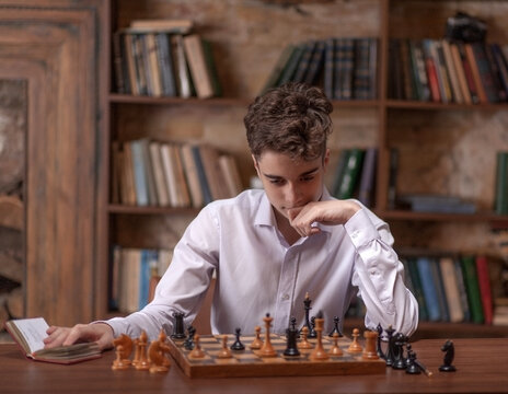 Young Man Considering His Next Chess Move Photo Background And Picture For  Free Download - Pngtree
